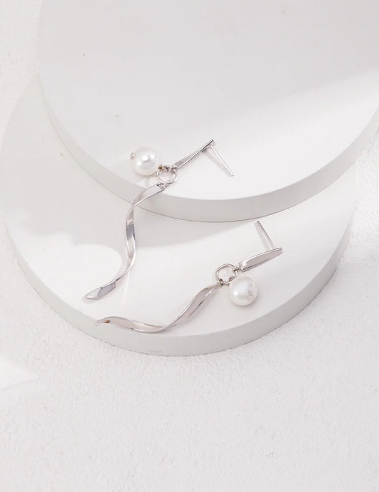 Pendientes vintage geométricos en espiral con perla