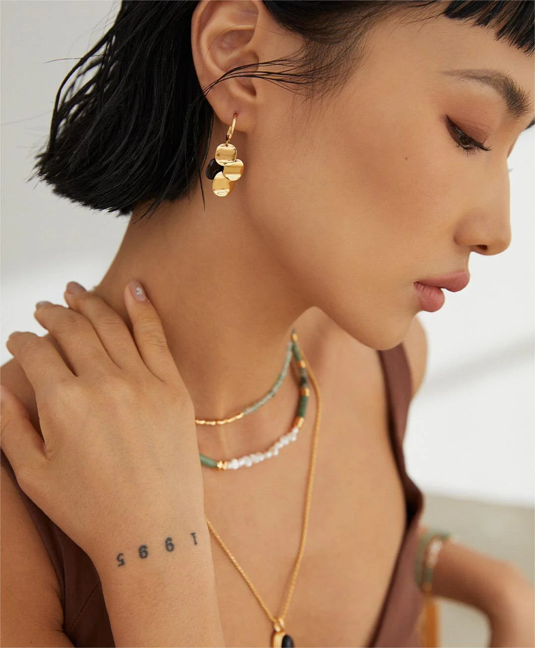 Pendientes Geométricos con Brillo en Capas