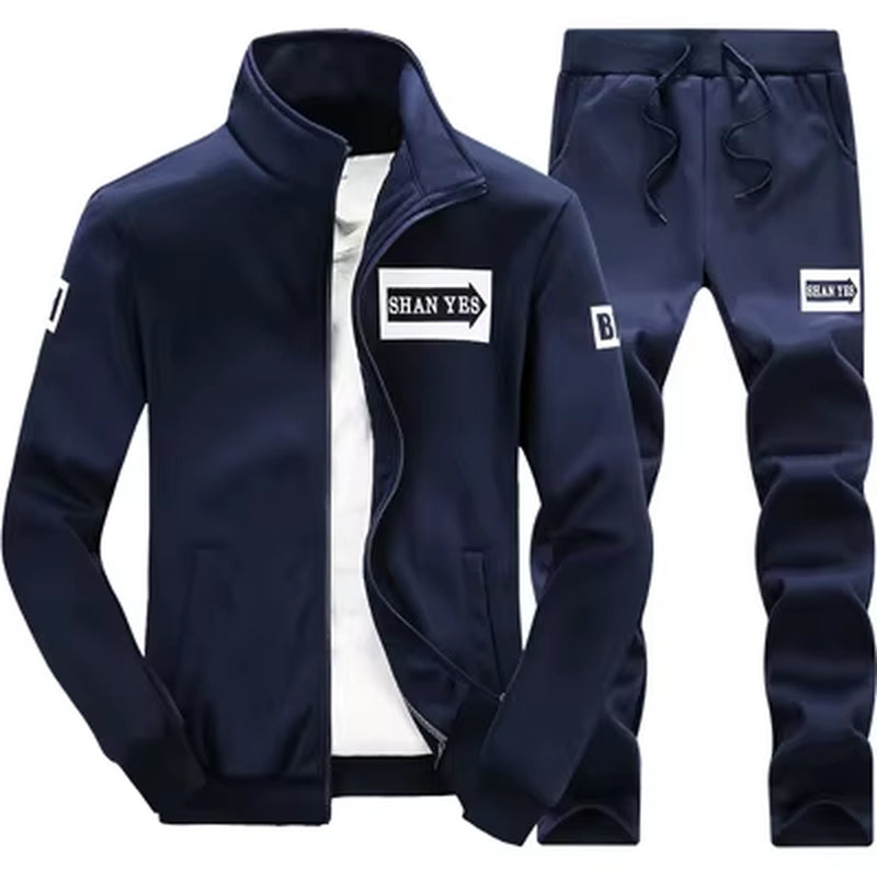 Conjunto deportivo de otoño para hombre. Sudadera y pantalón a juego, con diseño patchwork, cuello alto y capucha.