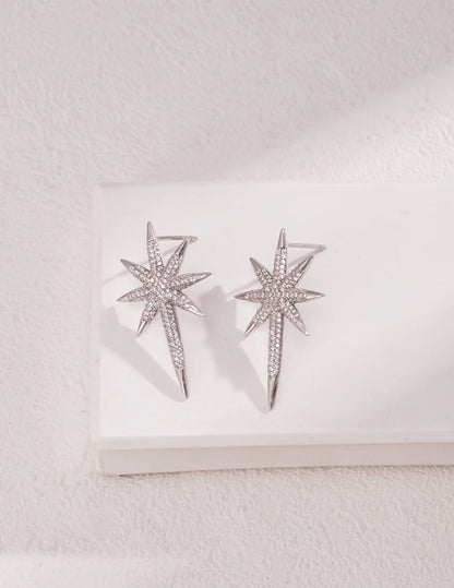 Pendientes tipo botón en forma de estrella