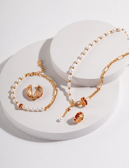 Anillo con cadena colgante y esmalte efecto goteo